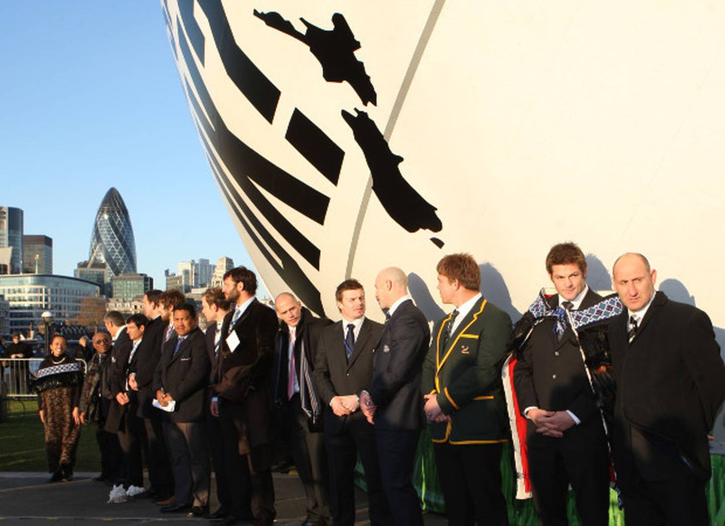Representatives of Rugby World Cup teams outside Tourism NZ's giant rugby ball in London in 2008