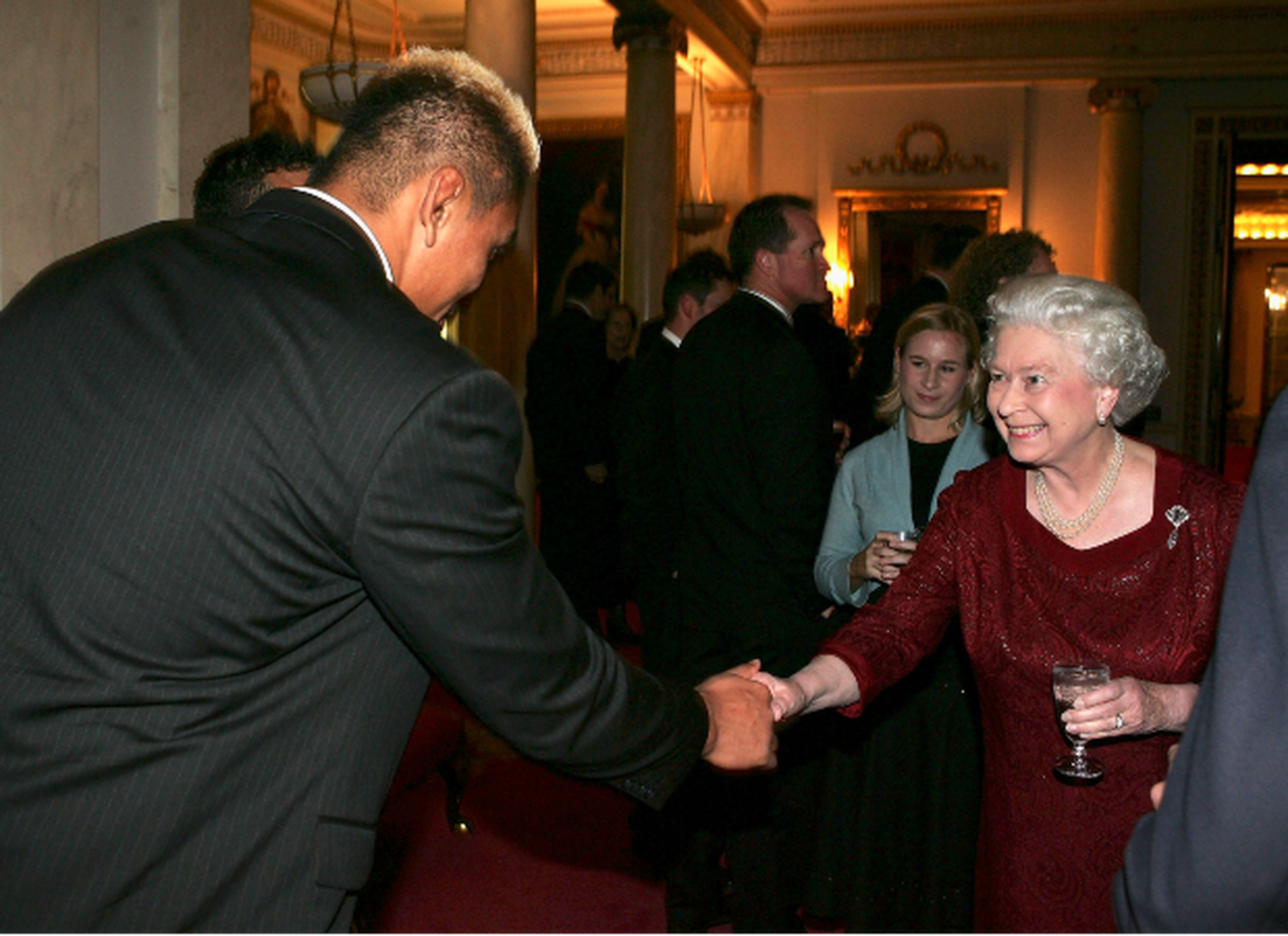 The late, great Jerry Collins meets the Queen